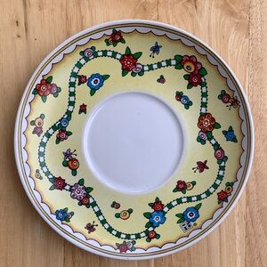 Mary Engelbreit vintage saucer yellow with floral design. Cute spring design